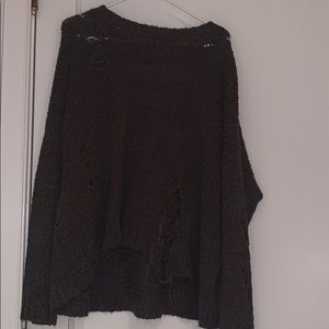 Brown oversized sweater with intentional holes